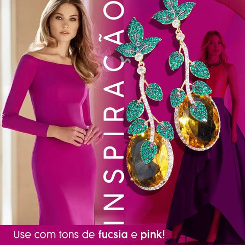 modelo com vestido liso longo em tom fúcsia texto: INSPIRAÇÃO, use com cores fúcsia e pink e brinco em destaque